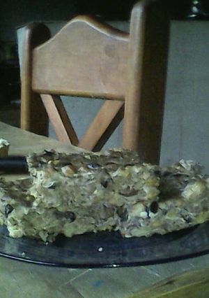 Una foto de Tortillón de porotos morados, negros, blancos, lentejas, garbanzos y mondongo y mucha mazamorra