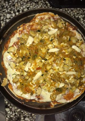 Una foto de Pizza de champiñones
