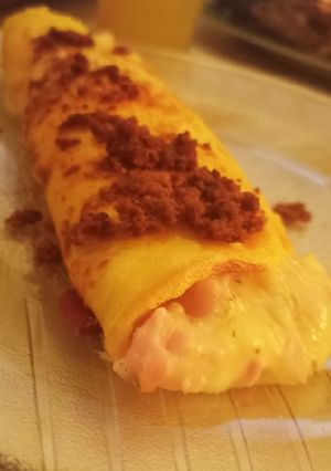 Una foto de Canelones de jamón y queso