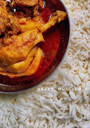 A picture of Homemade chicken curry with rice.