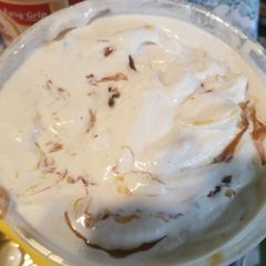 A picture of Butter pecan ice cream with caramel.