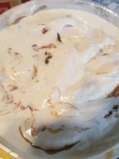 A picture of Butter pecan ice cream with caramel.