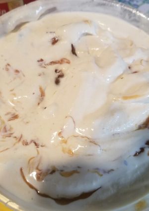 A picture of Butter pecan ice cream with caramel.
