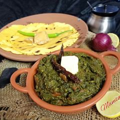 Sarso ka saag with makki di roti A picture of Sarso ka saag with makki di roti.
