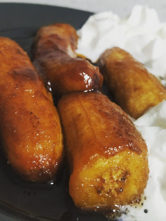 Una foto de Plátano flameado con caramelo de café