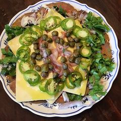 A picture of California Farm Cured Carpaccio Cheese Salad.