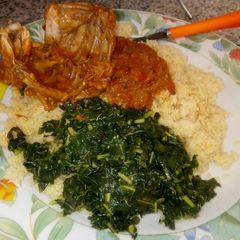A picture of Couscous with steam spinach.