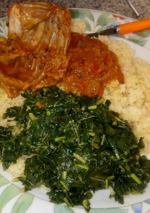 A picture of Couscous with steam spinach.