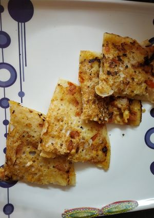 A picture of Stuffed uttapam.