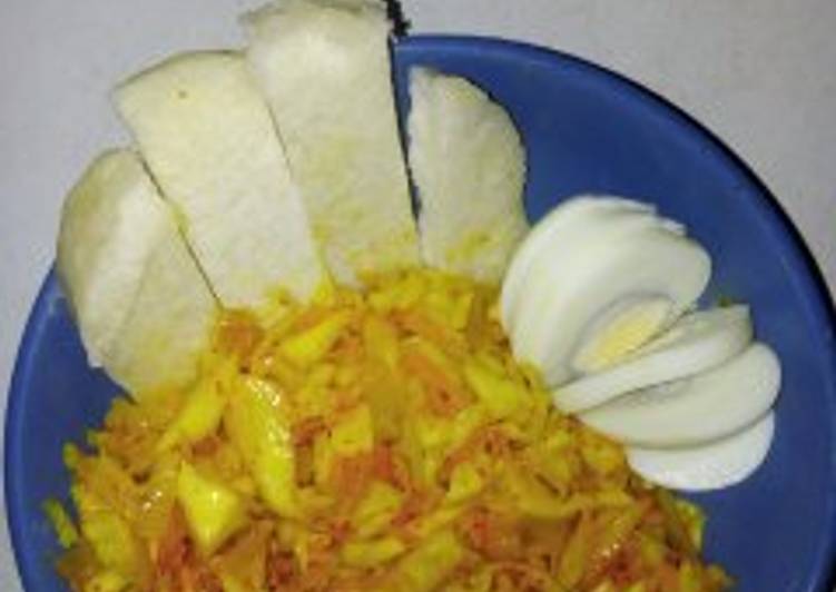 Cabbage and carrot stir fry with boiled egg