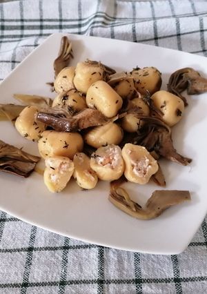 A picture of Ricotta and Walnut Stuffed Gnocchi with Artichokes.