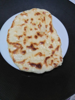 Foto de Naan com queijo e manteiga de alho