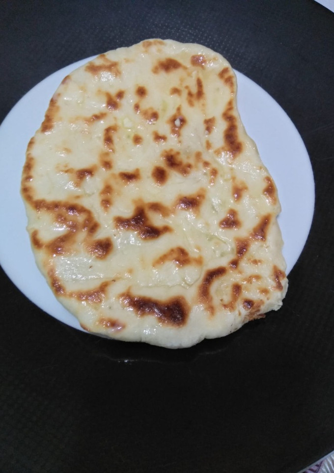 Foto de Naan com queijo e manteiga de alho