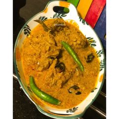 A picture of Doi-Shorshe Murgi/Chicken Besoro/Mustard Chicken.