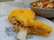 Una foto de arepas con polenta