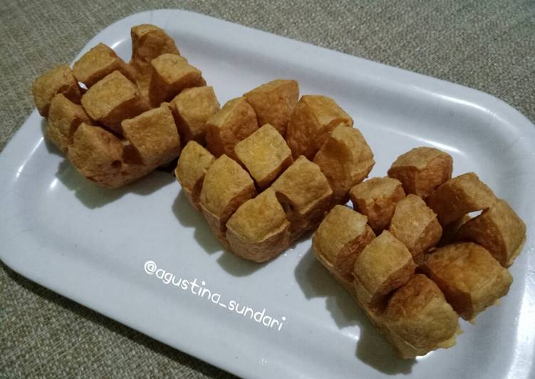 115. Tahu Domino