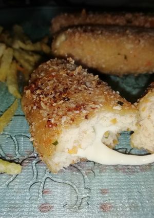 Una foto de Cilindros de pollo con queso
