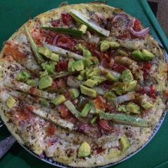A picture of Fried egg with cucumber and avacado.