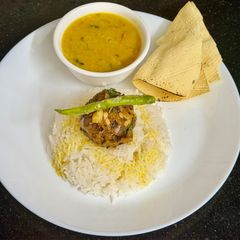 A picture of Kaddu Ka Bharta (Mashed Pumpkin) 🎃 Served With Steam Rice … A Traditional Bengali Dish.
