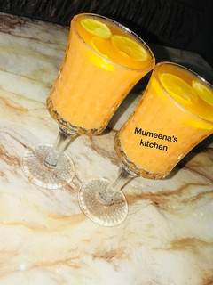 A picture of Carrot and apple drink.