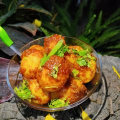 A picture of Schezwan sauce baby potatoes.