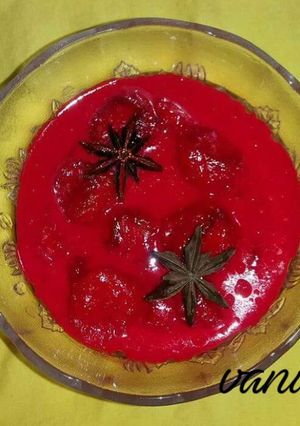 A picture of Honey dew banana in red milk sauce.