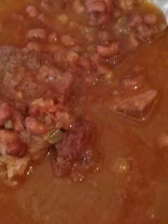 Una foto de Poroto con carne