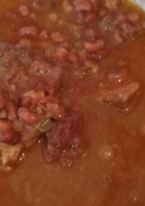 Una foto de Poroto con carne