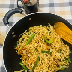Veg Hakka noodles with spring onions A picture of Veg Hakka noodles with spring onions.
