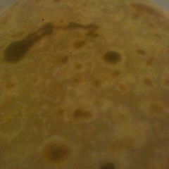 A picture of Soft brown chapatis.