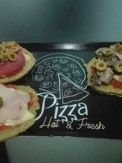 Una foto de 🍕 Mini pizza de quinoa sin harina