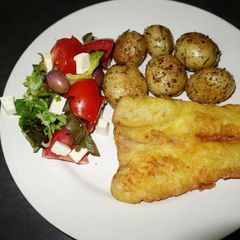 A picture of Beer batter Fish with Rosemary baked potatoes.