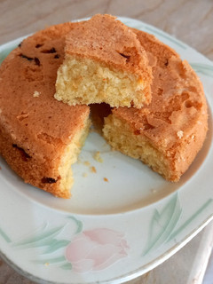 A picture of Vanilla cake, 🧀🧀with orange peels.