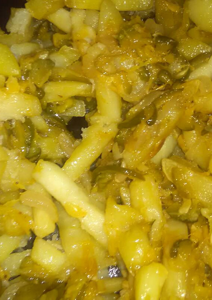 Una foto de Revuelto de papas fritas zapallitos y cebolla fácil y delicioso