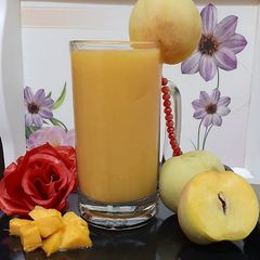 Mango peach Smoothie 🍑🥭🍑🥭 A picture of Mango peach Smoothie 🍑🥭🍑🥭.