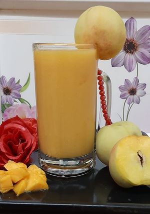 A picture of Mango peach Smoothie 🍑🥭🍑🥭.