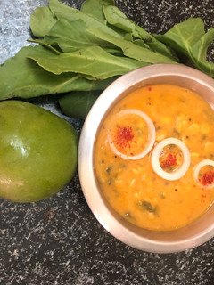 A picture of Palak mango dal.