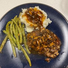 A picture of Asian Pepper / Mushroom Pork Chop.