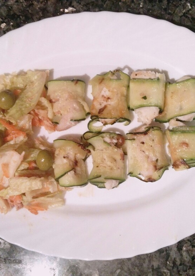Una foto de Pescado en manto de calabacín