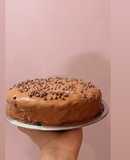 Moist eggless chocolate cake in cooker