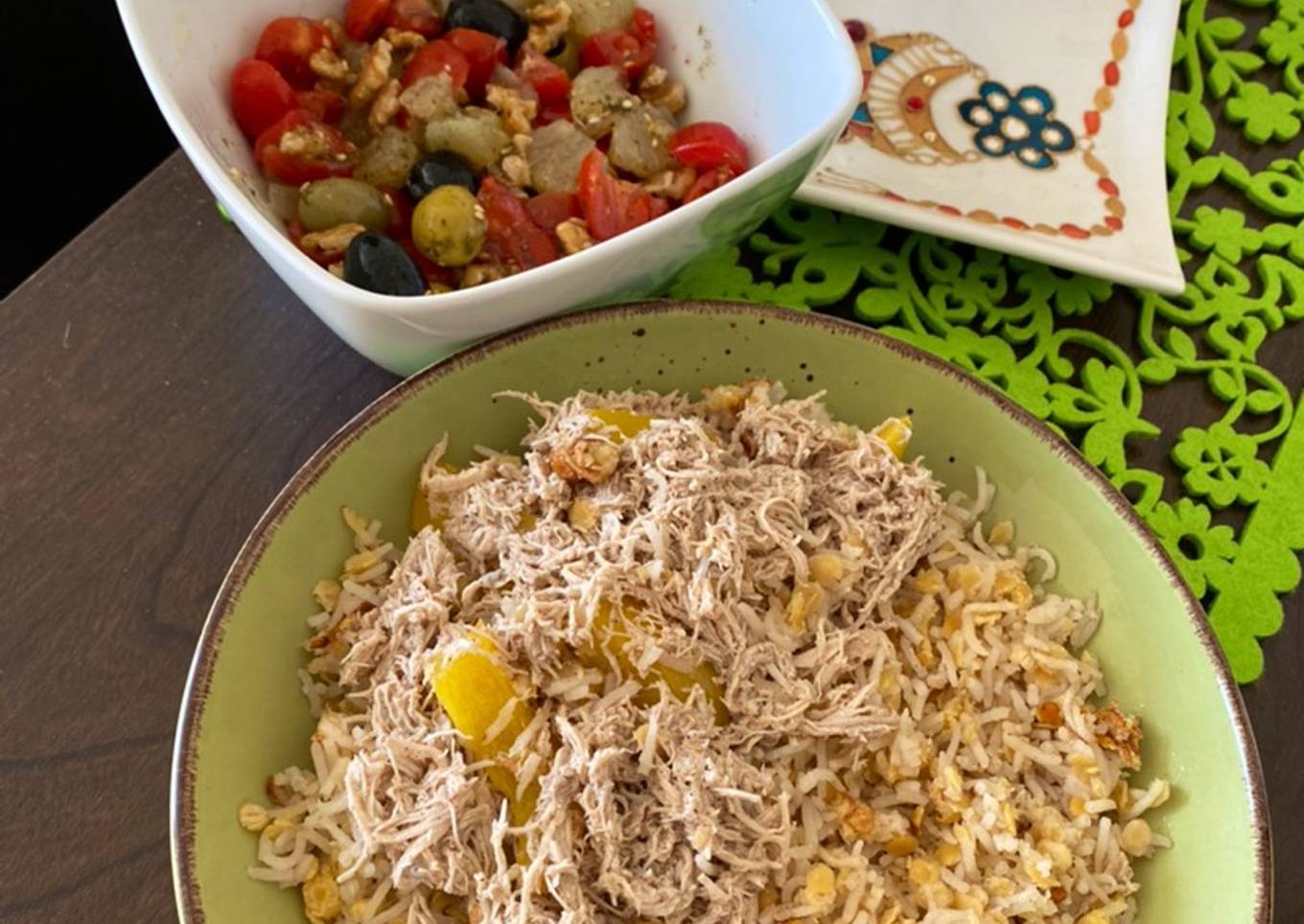 Healthy lunch Lentil with rice called Koshri and Chicken, salad