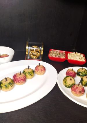 A picture of Mawa apple stuff with dryfruits (sweet dish).