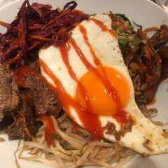 Beef and vegetable Korean rice bowl aka bibimbap A picture of Beef and vegetable Korean rice bowl aka bibimbap.