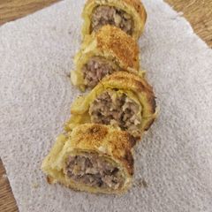 Sausage roll with mustard A picture of Sausage roll with mustard.