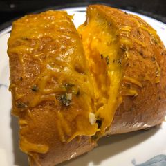 A picture of Grilled Italian ~ Garlic ~ Cheese 🧀 Stuffed Bread 🥖.