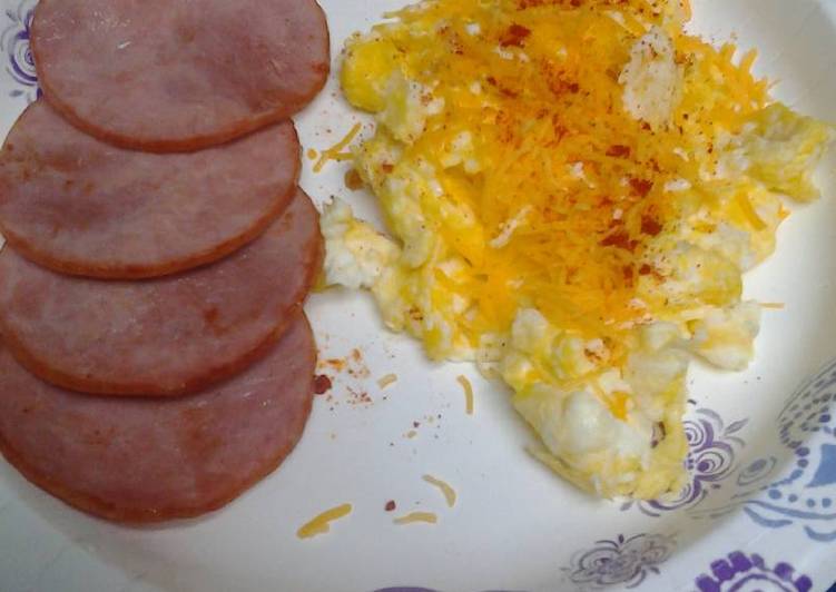 Canadian bacon with cheesy eggs