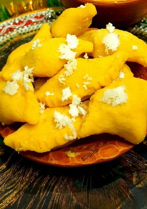 তালের ভাপা পুলি পিঠা (Taler puli pitha recipe in Bengali) রেসিপির প্রধান ছবি