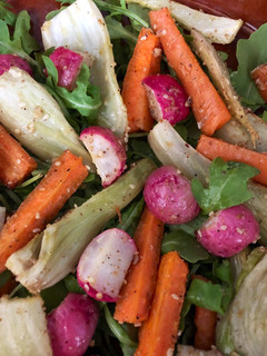 A picture of Warm Spring salad with roasted radishes, carrots and fennel - vegan.
