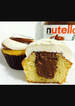Una foto de Cupcakes de vainilla y dulce de leche