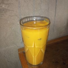 A picture of Mango grapes melon and banana smoothie.